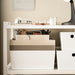 White storage bin with a gray stripe on a shelf with office supplies.