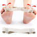 white elastic toe stretcher band worn on both feet for bunion correction