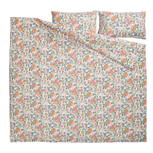 Floral patterned bed sheet set on a white background