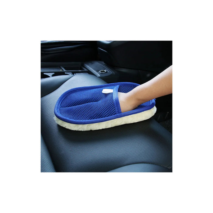 Blue car cleaning mitt on a car seat