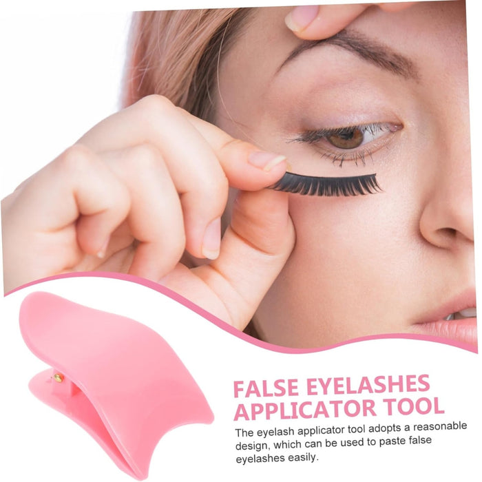 Woman applying false eyelashes with an applicator tool on a white background