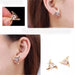 Triangle gold earrings – stud earrings with triangular gemstone and gold prongs, shown worn and separately on display