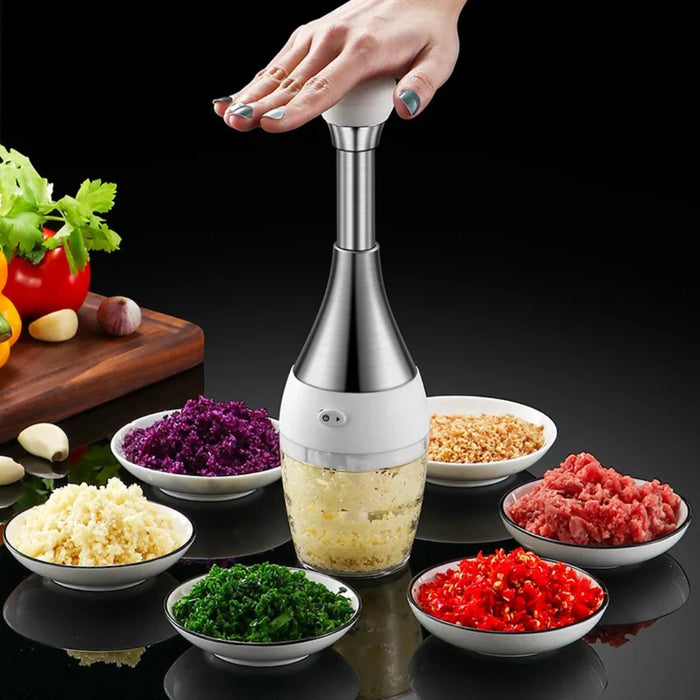 Demonstration of the masher's versatility in mincing various ingredients like purple cabbage, greens, peanuts, meat, and chilies.