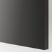 Corner view of matte black panel mounted on white wall – 80537827