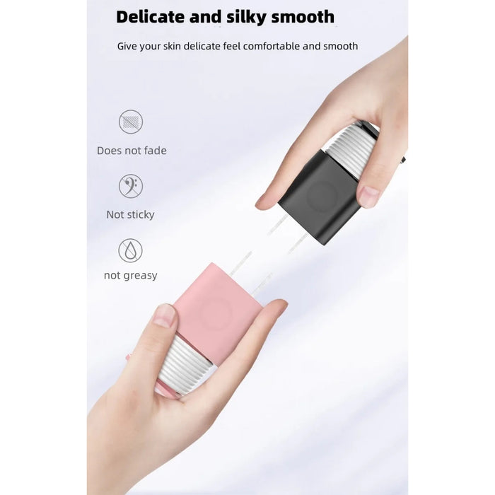 Hand holding a pink skincare product with text about its benefits on a light gray background