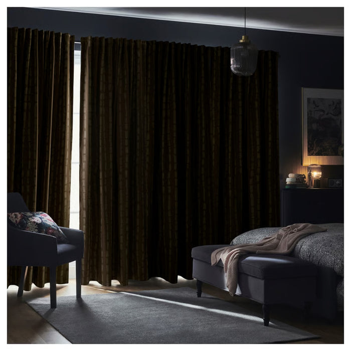  Bedroom styled with HÄCKBERBERIS curtains in dark beige, paired with textured bedding, upholstered bench, and cozy lighting