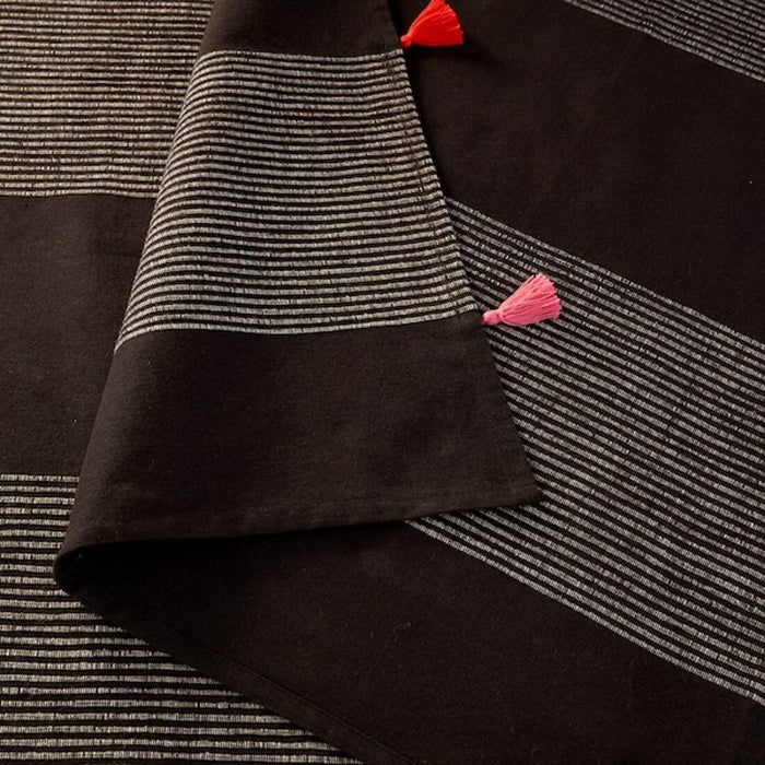 IKEA DEKORERA Throw, anthracite, 130x160 cm with RSPRUNGLIG Bedspread, white/black, 150x250 cm and  JÄTTEVALLMO Pillowcase, beige/dark grey, 50x80 cm