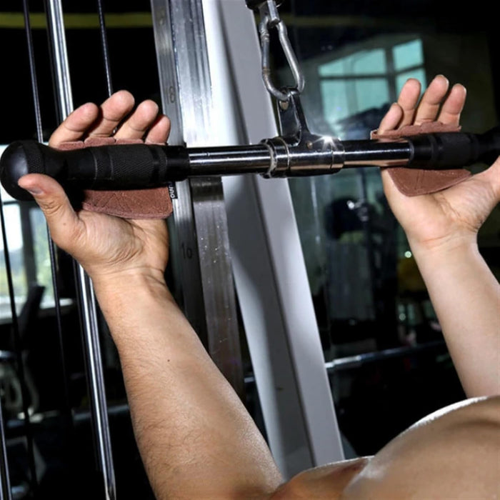 Person using a cable machine in a gym setting