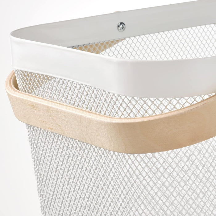Close-up view of the natural light wooden handle and white metal mesh of the IKEA RISATORP basket, showing the texture and attachment point.90530397