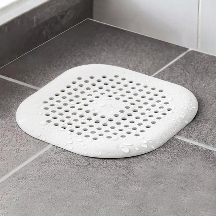 Flexible rubber hair catcher for drains – reusable, easy-to-clean & fits most pipe sizes.