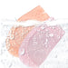 Skin and pink silicone socks submerged in water showing washable design