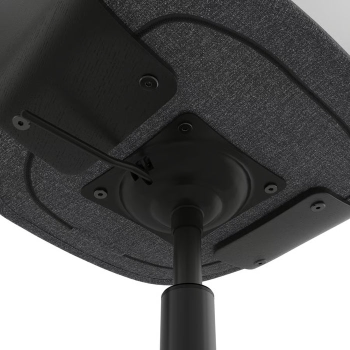 Close-up of a black speaker on a gray background