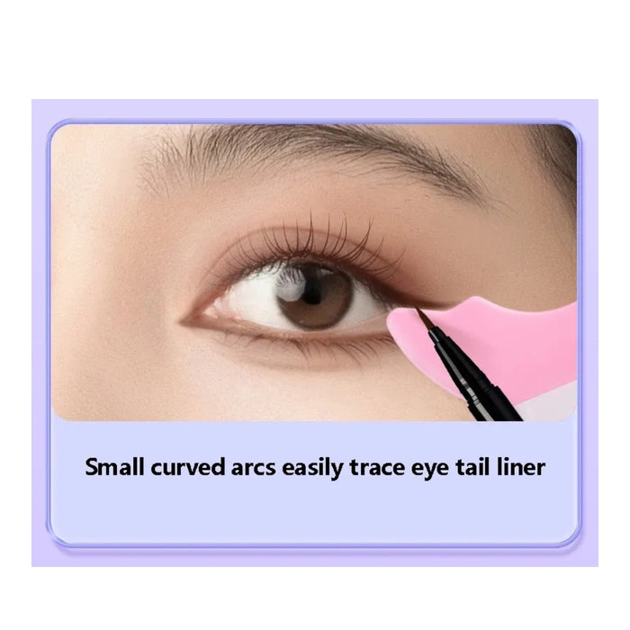 Eyeliner tool with pink and black design being used to trace eye liner on a close-up of an eye.
