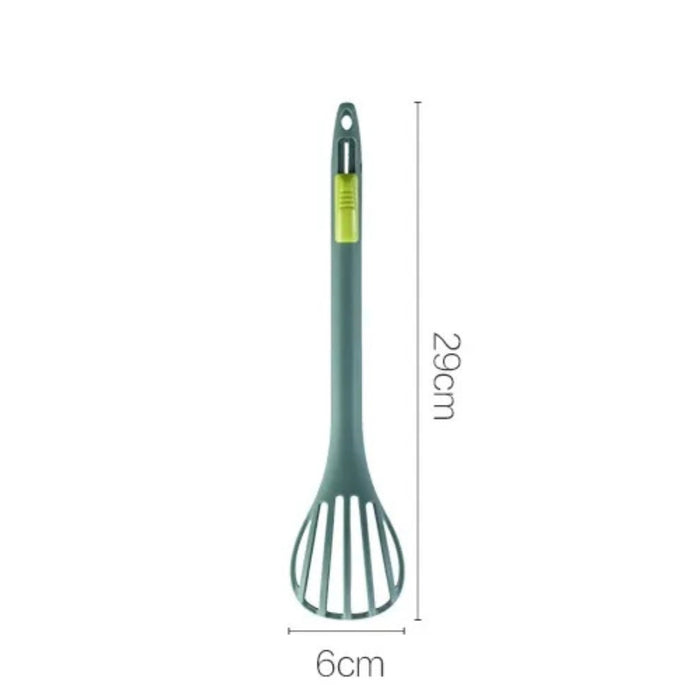 Green slotted spoon with 29 cm length and 6 cm head width, designed for draining and serving with ease