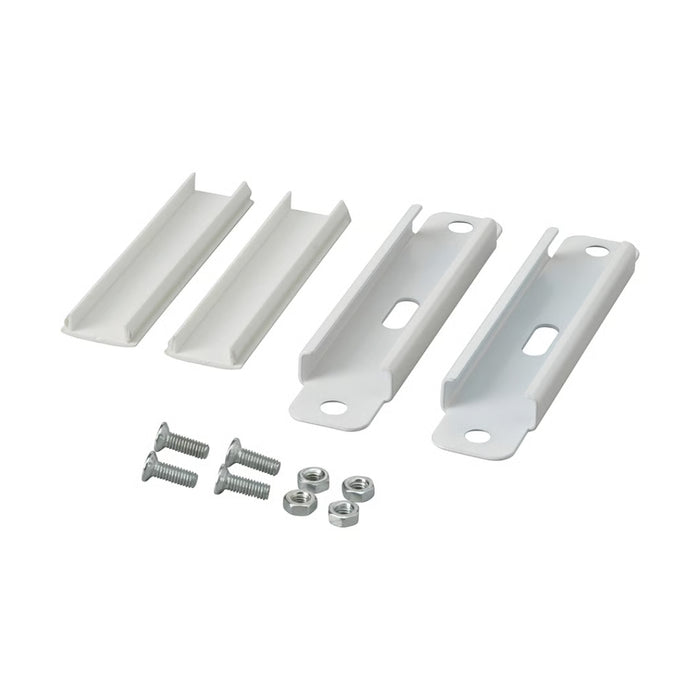 Set of white metal brackets and screws on a white background