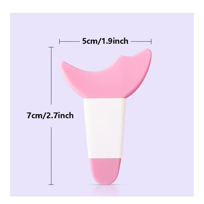 Pink and white tool with measurements on a light purple background
