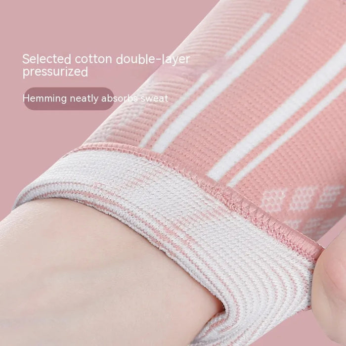 Close-up of pink compression sleeve on wrist – double-layer cotton with pressurized fit and neatly hemmed edge for sweat absorption – 1600002527315