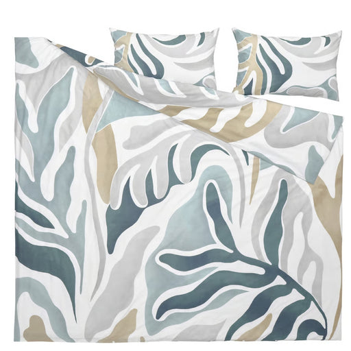 Floral patterned bedding set with a pillow on a white background