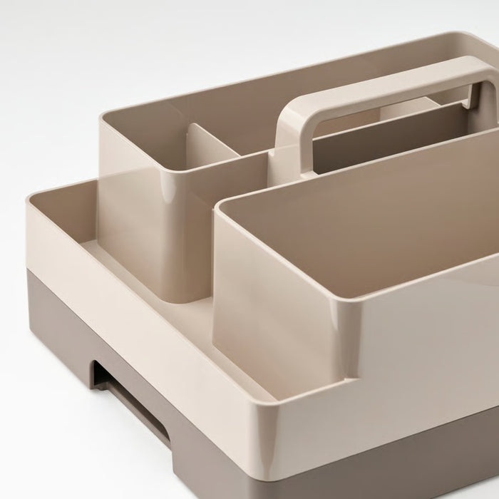 Beige and gray storage tray with compartments and a handle on a light gray background