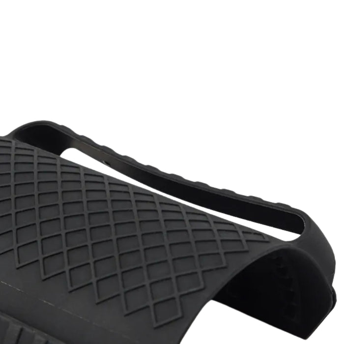 Black textured silicone grip with a diamond-patterned surface and a looped handle—designed for enhanced grip and heat insulation. Flexible and durable, it’s ideal for safely handling hot cookware, lids, or utensils in the kitchen.1598452898401 13017586
