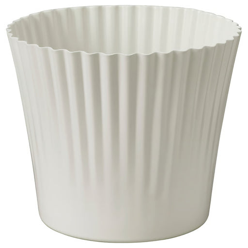 White ribbed cupcake liner on a white background
