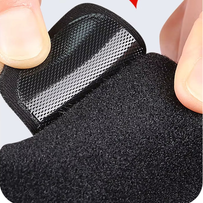 Black textured glove with mesh pattern on a light gray background