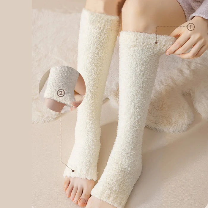 Close-up of cream plush leg warmers worn below knees with numbered fit indicators - 