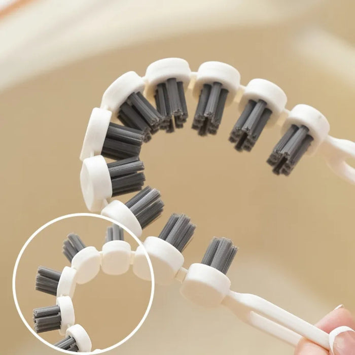 Close-up of segmented curved brush with dark gray bristles in white holders – magnified inset highlights flexible design for narrow surfaces – 1600001512507 13955116