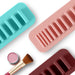 Portable silicone mask applicator brush for lotions, peels, and beauty routines.