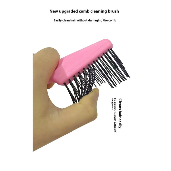 Hand holding a pink upgraded comb cleaning brush with black bristles—designed for easy hair removal from combs without causing damage. On-image text highlights: “New upgraded comb cleaning brush,” “Easily clean hair without damaging the comb,” and “Flexible bristles with sufficient toughness” – 1600006854656 13271574.