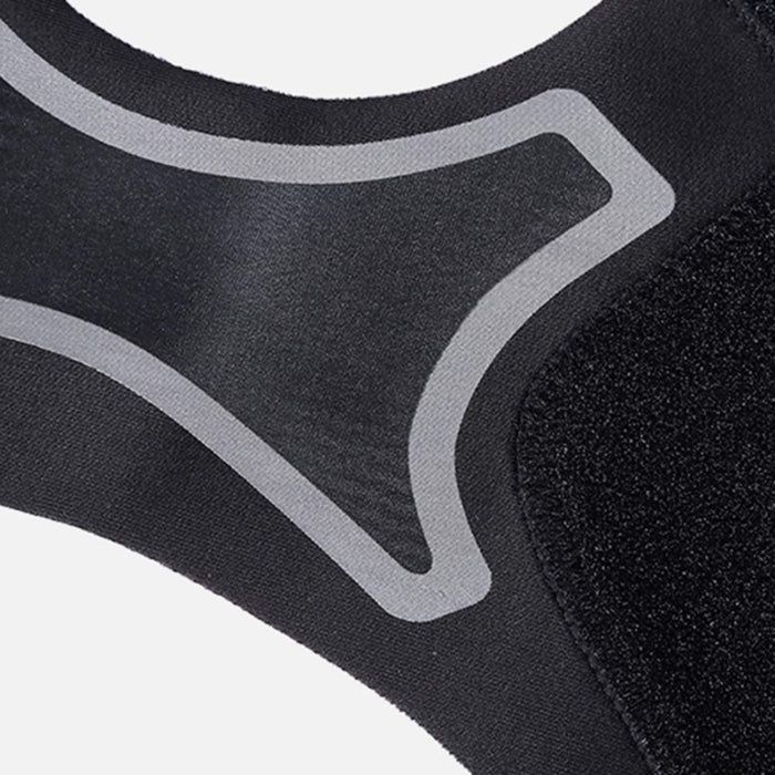 Close-up of black ankle brace fabric showing textured Velcro and gray rubber-like design – highlights breathable construction and reinforced zones – 1600007421321 13974241
