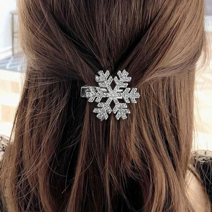 Crystal snowflake hair clip – back view with pulled hair and sparkling rhinestone snowflake design