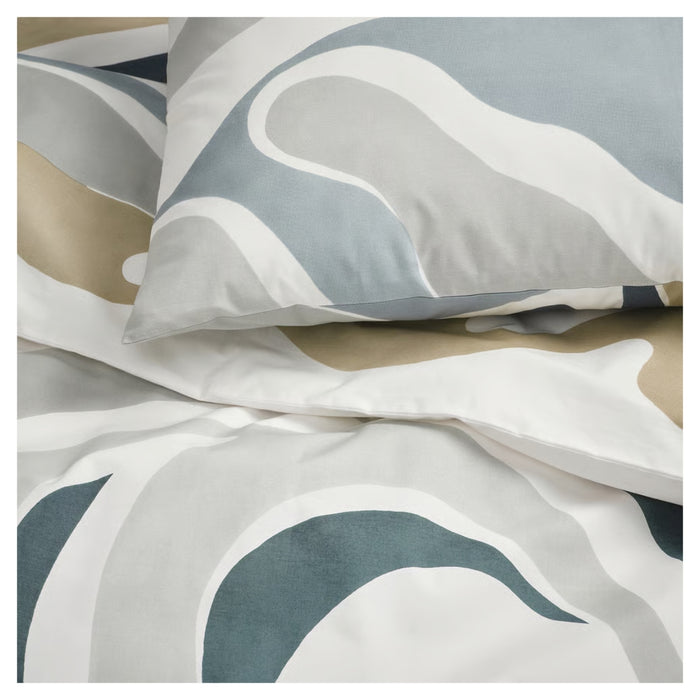 Patterned bedding with geometric design on a neutral background