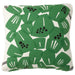 Decorative pillow with green leaf pattern on a white background