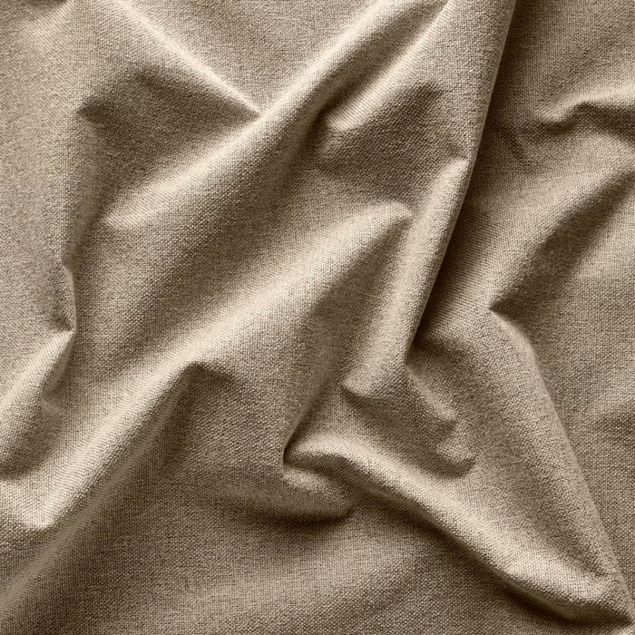 Close-up of beige fabric with folds