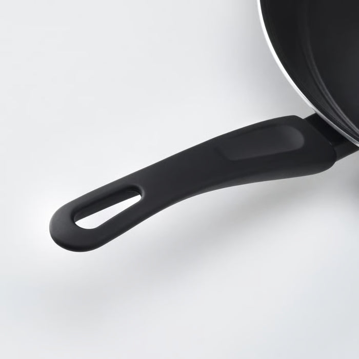 Black frying pan handle on a white background