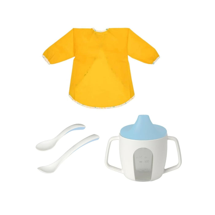 Yellow bib, white spoon, and white sippy cup with blue lid on a white background