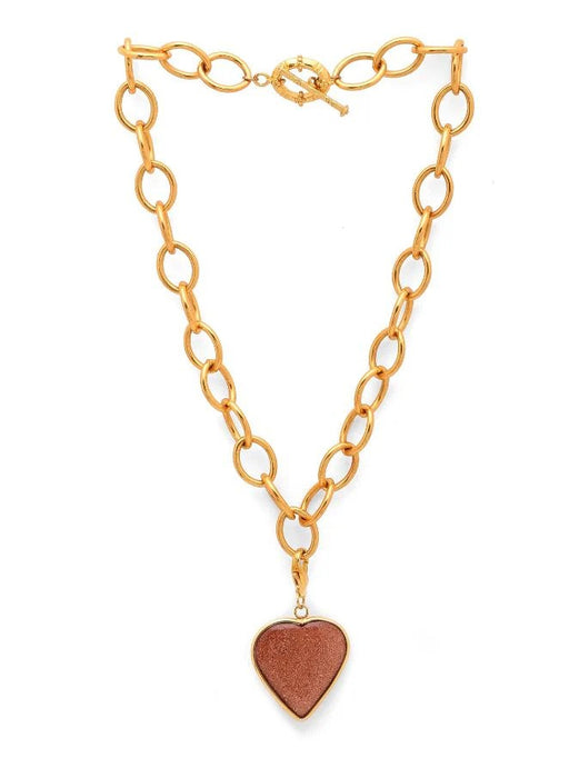 Gold chain necklace with a heart-shaped pendant on a white background
