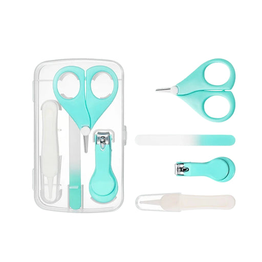 Turquoise nail care set with scissors, clipper, and other tools on a white background