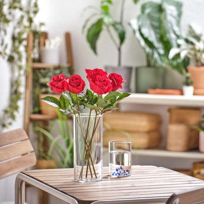 Close-up of IKEA SMYCKA artificial red rose petals and leaf detailing