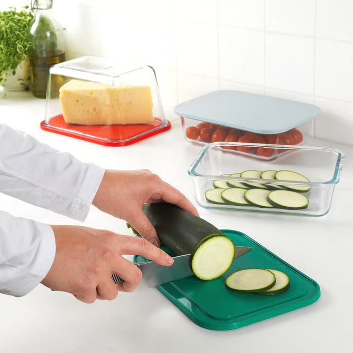 IKEA 365+ blue chopping board on kitchen counter with fruits vegetables and blender