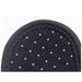 Black textured patch with white dots on a white background