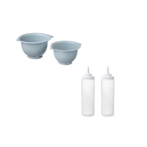 Two blue bowls and two white bottles with caps on a white background