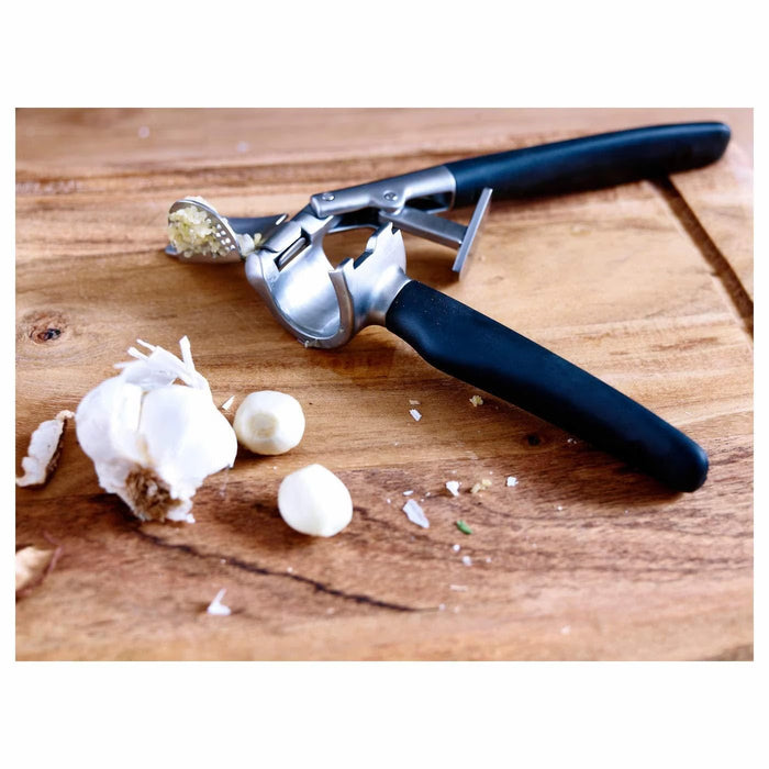  IKEA VÄRDEFULL garlic press black side angle showing matt chrome zinc body and grip