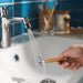 IKEA ÅBÄCKEN chrome mist nozzle installed on silver mixer tap modern bathroom setting