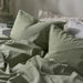 IKEA ÄNGSLILJA bedding set showing soft cotton texture and calm grey-green colour