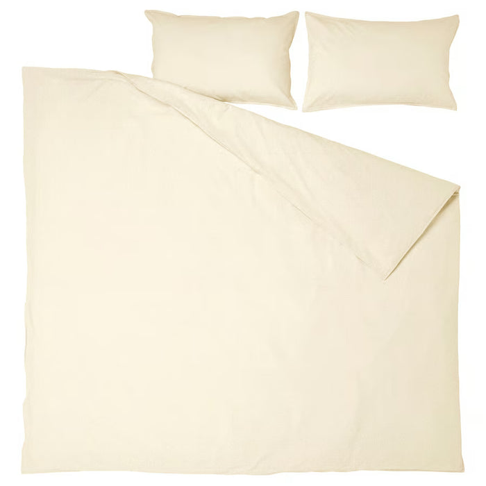 IKEA ÄNGSLILJA natural beige duvet cover and pillowcases folded and stacked