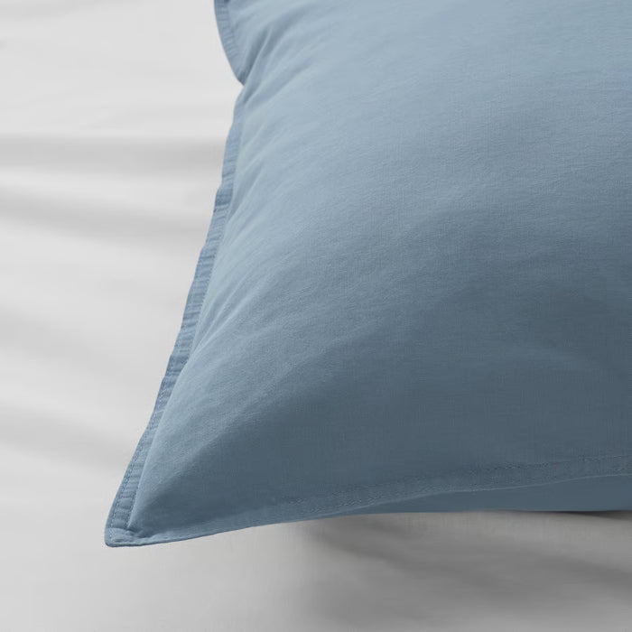 IKEA ÄNGSLILJA blue-grey pillowcase soft cotton texture close-up on white surface