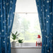 IKEA AFTONSPARV colour-changing rocket lamp with space-themed curtains in kids room