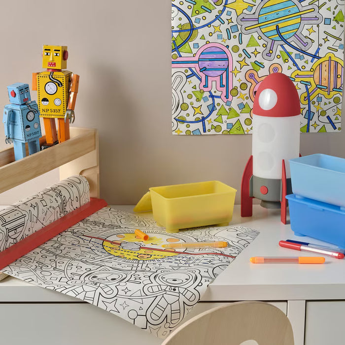 IKEA AFTONSPARV rocket lamp on children's desk with colouring mat and toys